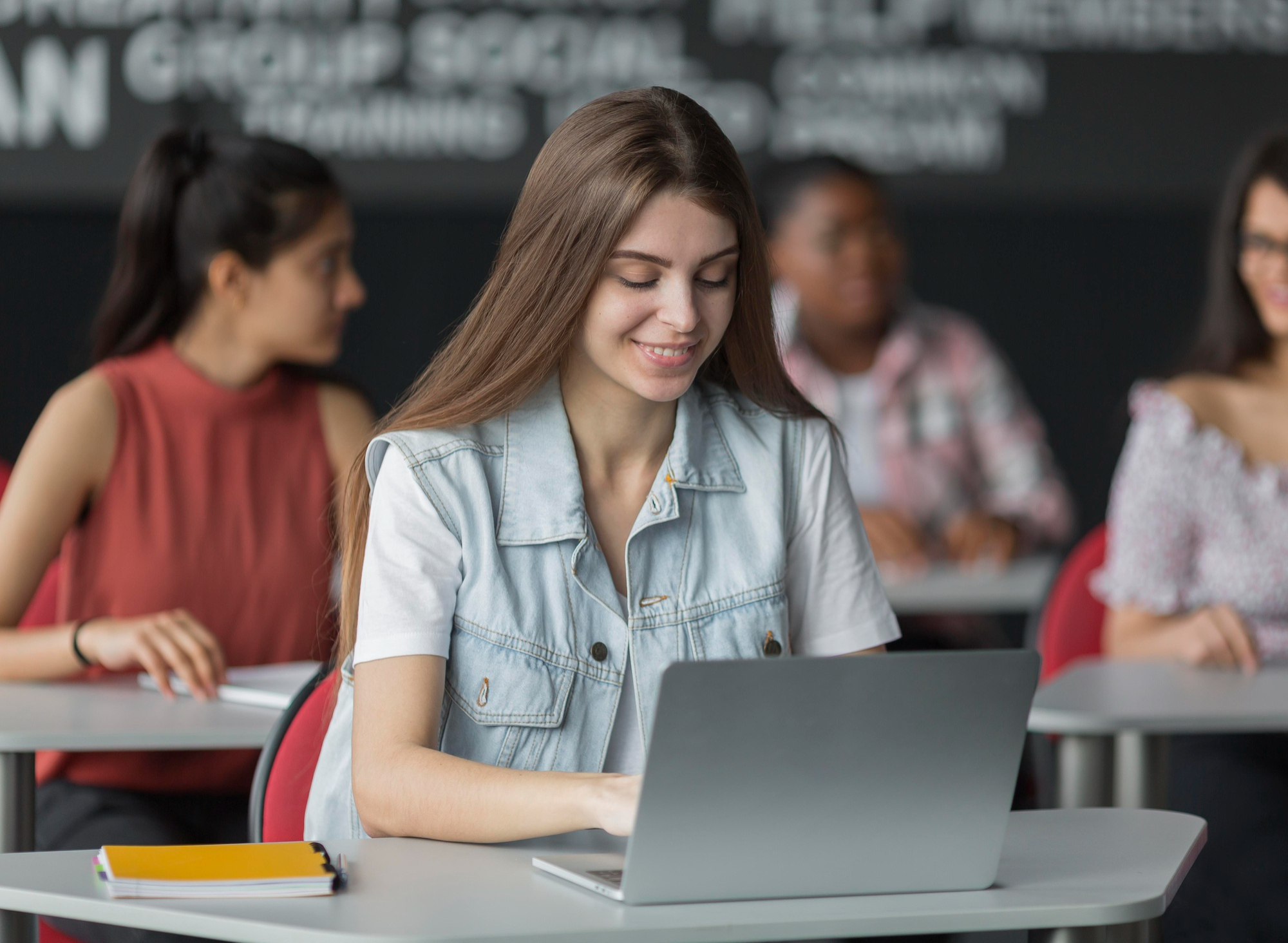 Students using TedQu platform in modern classroom